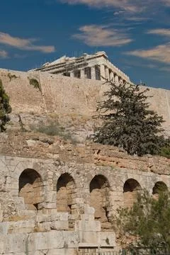 View of the  Acropolis surrounded by ancient architecture in Athens, Greece.. Stock Photos