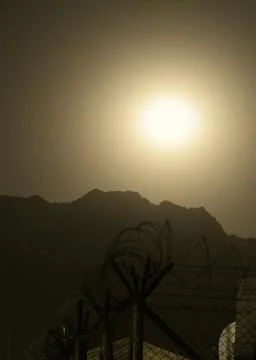 A view across the barbed wire at Camp Black Horse, Afghanistan. Stock Photos
