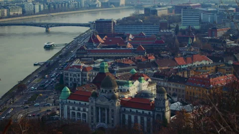 View across Budapest rooftops revealing dense historic architecture and city Vídeo Stock 326065348
