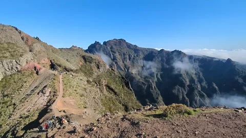 View across mountains on route PR1 Pico do Arieiro Madeira Portugal Stock Footage 307793114