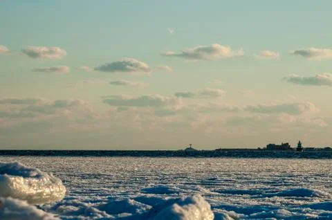 View across New Bedford outer harbor on cold winter evening Stock Photos