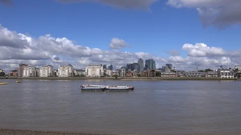 A view across the River Thames of Canary Wharf, London, UK Stock Footage 112976474