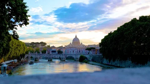 The view across the River Tiber towards St. Peters Basilica in the Vatican fr Stock Footage 113658688