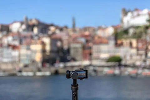 View of a action camera on a gimbal stabilizer, filming footage Stock Photos