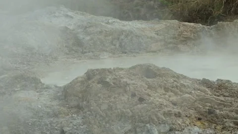 View of an active crater spewing white hot steam Stock-Footage 319906853