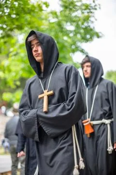 View of actor dressed in medieval clothes on medieval market Stock Photos
