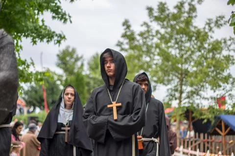 View of actor dressed in medieval clothes on medieval market Stock Photos
