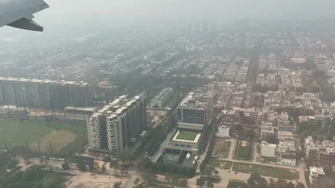 View from the aeroplane window to the ground. Landscape view from the sky to  Stock Footage 205799681