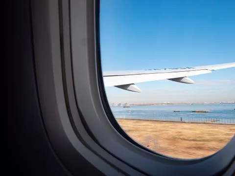 View from an aeroplane window as it prepares for take off Stock Photos