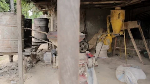 View of the aged but still functioning power machines at a rice mill and 動画素材 165983154