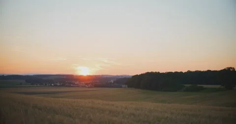 View of Agricultural Fields During Golden Sunset Stock Footage 281603836