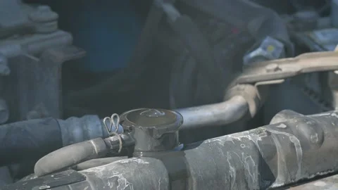 View of air bubbles coming out of a heating hole car engine 動画素材 160897002