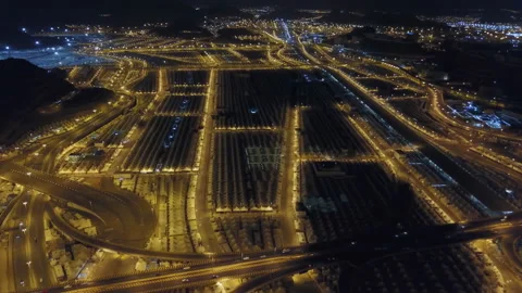 A view from the air at night to the tent camp of pilgrims in the Mina Valley Stock Footage 106672763
