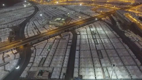 A view from the air at night to the tent camp of pilgrims in the Mina Valley Stock-Footage 106935238