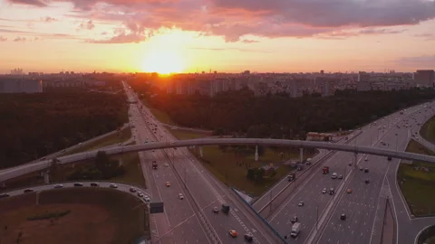 View from the air on the traffic on road junctions at the exit of the city Video stock 141156412