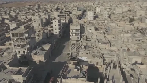 View from the air to the war-torn city of Aleppo, Syria. Video stock 169237784