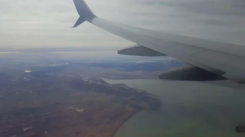 View from aircraft window-Bare winter landscape and lake Stock-Footage 148445499