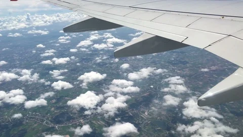 View from aircraft window with blue sky and clouds Stock Footage 89694299