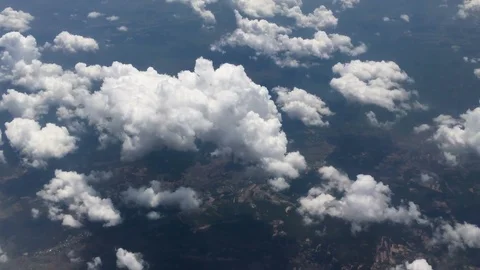 View from aircraft window with blue sky and clouds Stock Footage 89694927
