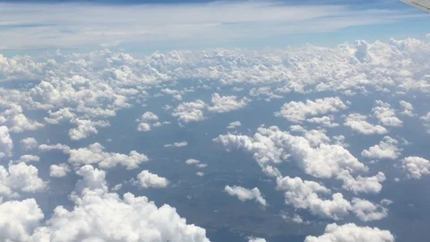View from aircraft window with blue sky and clouds Stock Footage 89695092