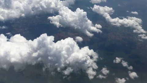 View from aircraft window with blue sky and clouds Stock Footage 89695220