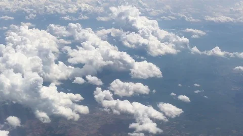 View from aircraft window with blue sky and clouds Stock Footage 89695310