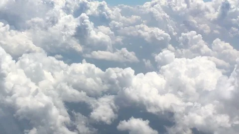 View from aircraft window with blue sky and clouds Stock Footage 89695599