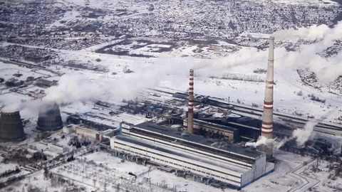 View from the aircraft window to the factory. Stockbeeldmateriaal 75075531