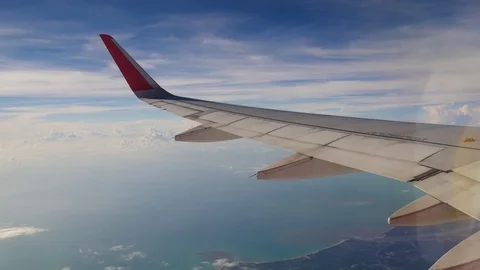 A view from the airplane. The aircraft is flying through the clouds Vídeo Stock 71754572