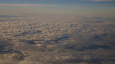 A view from the airplane. The aircraft is flying through the clouds Vídeos de archivo 71754629