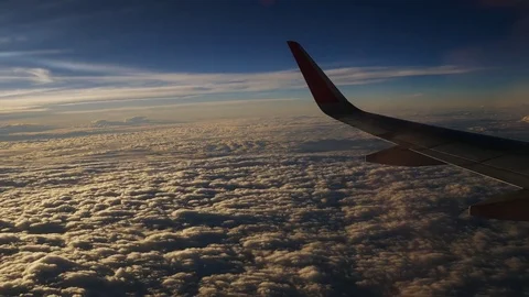 A view from the airplane. The aircraft is flying through the clouds 動画素材 71755054