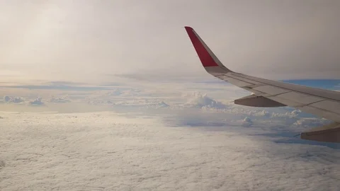 A view from the airplane. The aircraft is flying through the clouds Vídeo Stock 71755412
