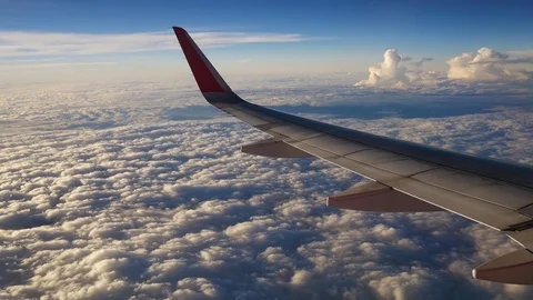 A view from the airplane. The aircraft is flying through the clouds Видео 71755443