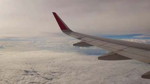 A view from the airplane. The aircraft is flying through the clouds Vídeo Stock 71755475