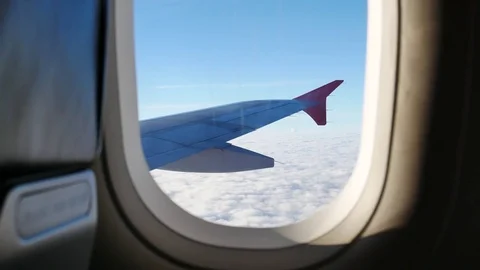 A view from the airplane. The aircraft is flying through the clouds Видео 71943025