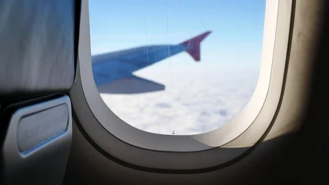 A view from the airplane. The aircraft is flying through the clouds Vídeos de archivo 71943078