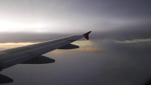 A view from the airplane. The aircraft is flying through the clouds Stockbeeldmateriaal 71943129