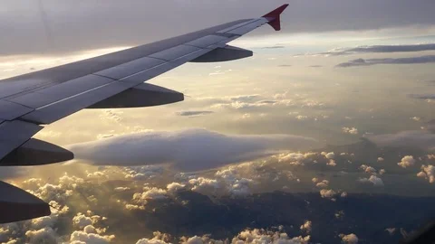A view from the airplane. The aircraft is flying through the clouds Vídeos de archivo 71943144