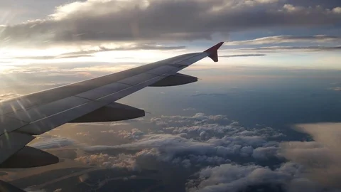 A view from the airplane. The aircraft is flying through the clouds Stockbeeldmateriaal 71943169