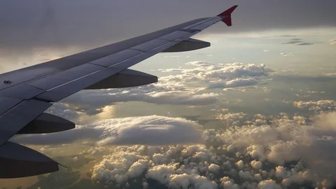 A view from the airplane. The aircraft is flying through the clouds Vídeos de archivo 71943456