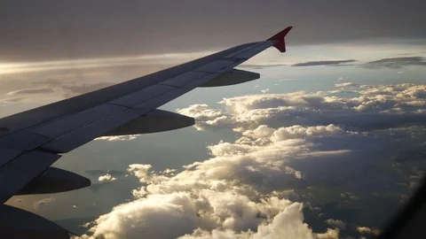 A view from the airplane. The aircraft is flying through the clouds Видео 71943719