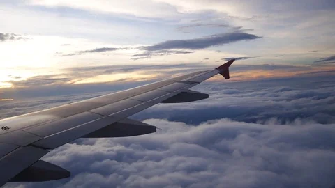 A view from the airplane. The aircraft is flying through the clouds Stockbeeldmateriaal 71943734