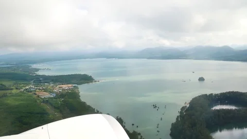 A view from the airplane. The aircraft is flying through the clouds.Air tra.. Vídeo Stock 75887418