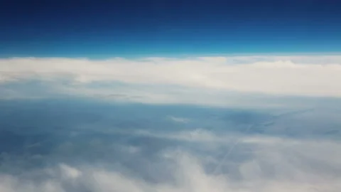 View from the airplane. Clouds. Aerial Stock Footage 133783661