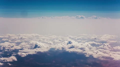 View from the airplane. Clouds. Aerial Stock Footage 133784174