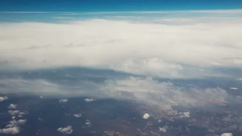 View from the airplane. Clouds. Aerial Stock Footage 133784192