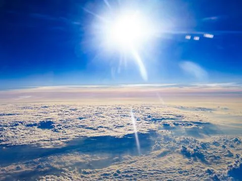 View from airplane to clouds Stock Photos