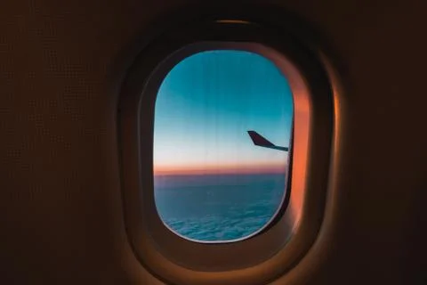 View from airplane. Flight window. Vacation destinations. Tropical beach. Stock Photos
