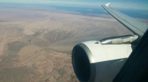 View from the airplane. Flying aicraft over desert near the Red Sea Video stock 59677771