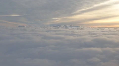 View from airplane flying into clouds evening Video stock 219047724